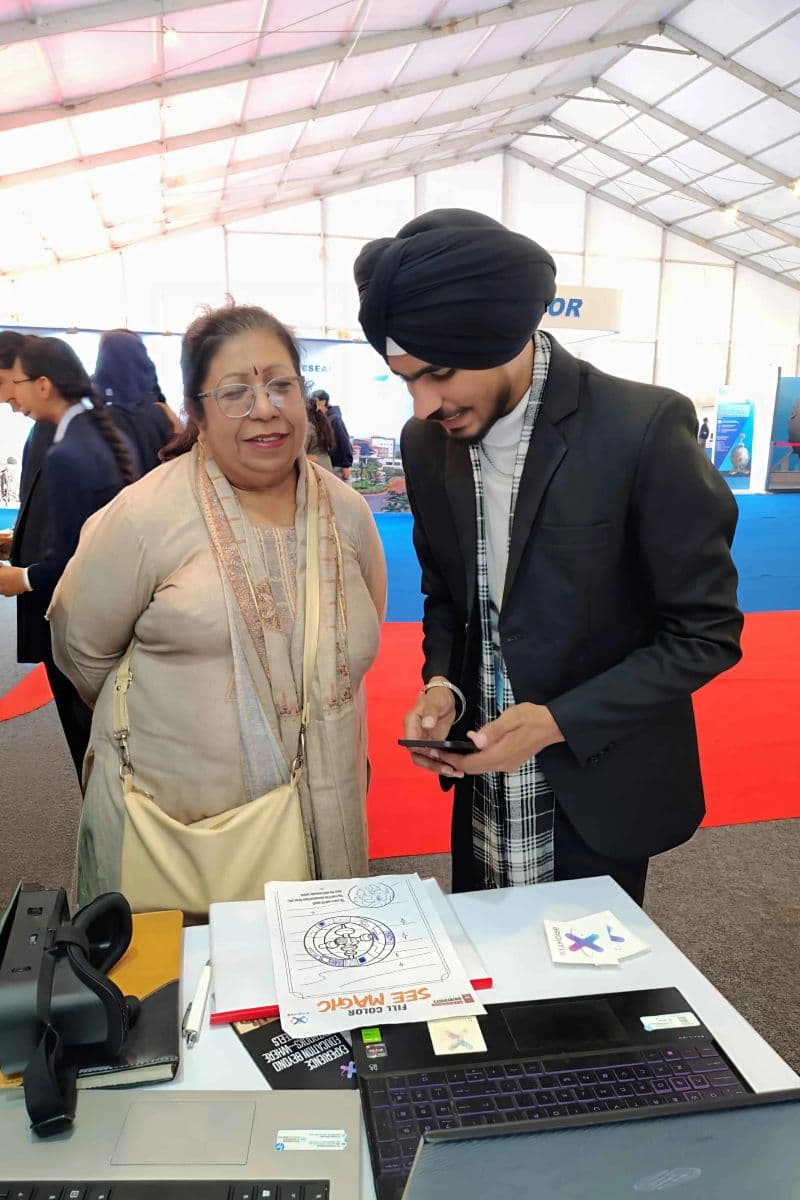 Teacher using interactive whiteboard with AR overlay