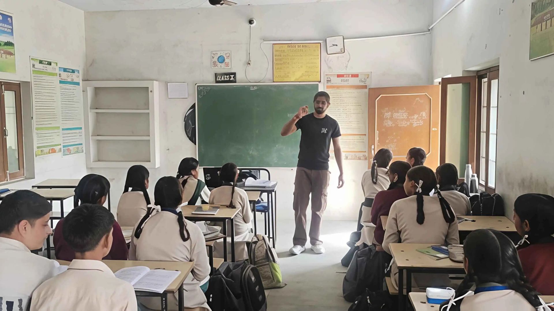 Students wearing VR headsets in modern classroom experiencing immersive virtual reality educational content