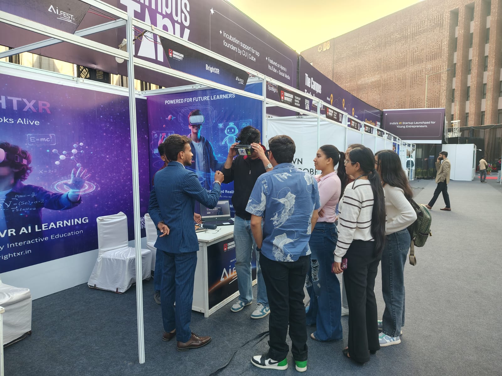 Crowd engaging with AI demonstrations at the fest